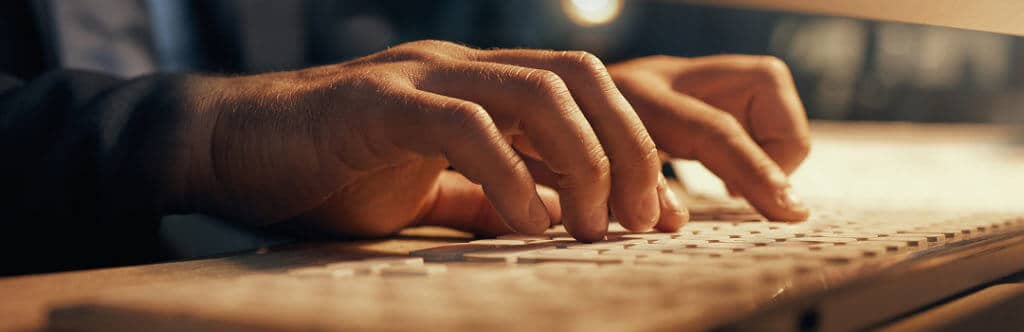 hacker web developer software designer typing computer keyboard research coding programming closeup hands man internet browsing while working late night cyber security code 1